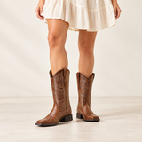 Ariat Women's Round Up Remuda Aged Tan Western Boots — worn by a woman (AI-generated lifestyle image)