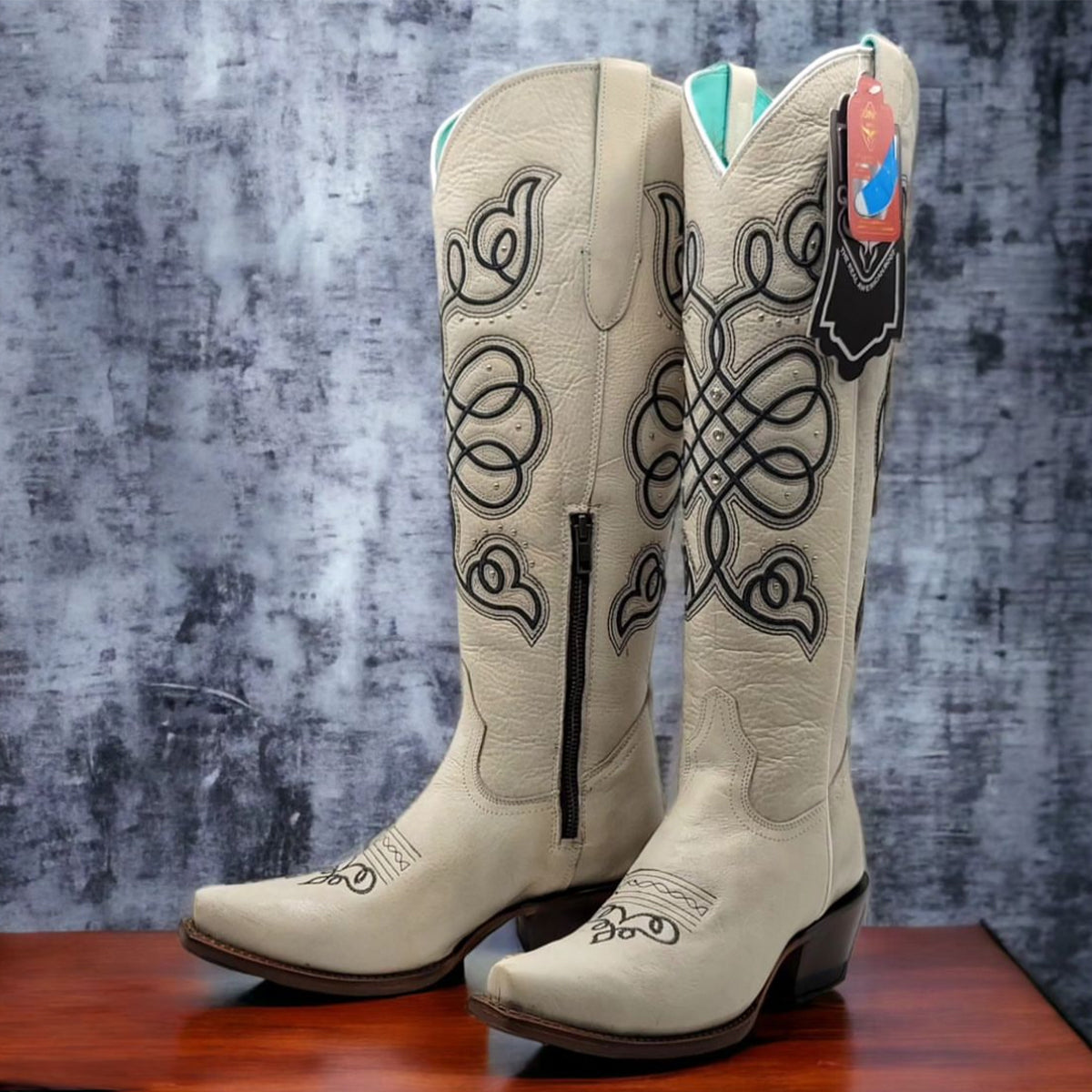 Off-White Tall Cowgirl Boots with Stylish Snip-Toe Design