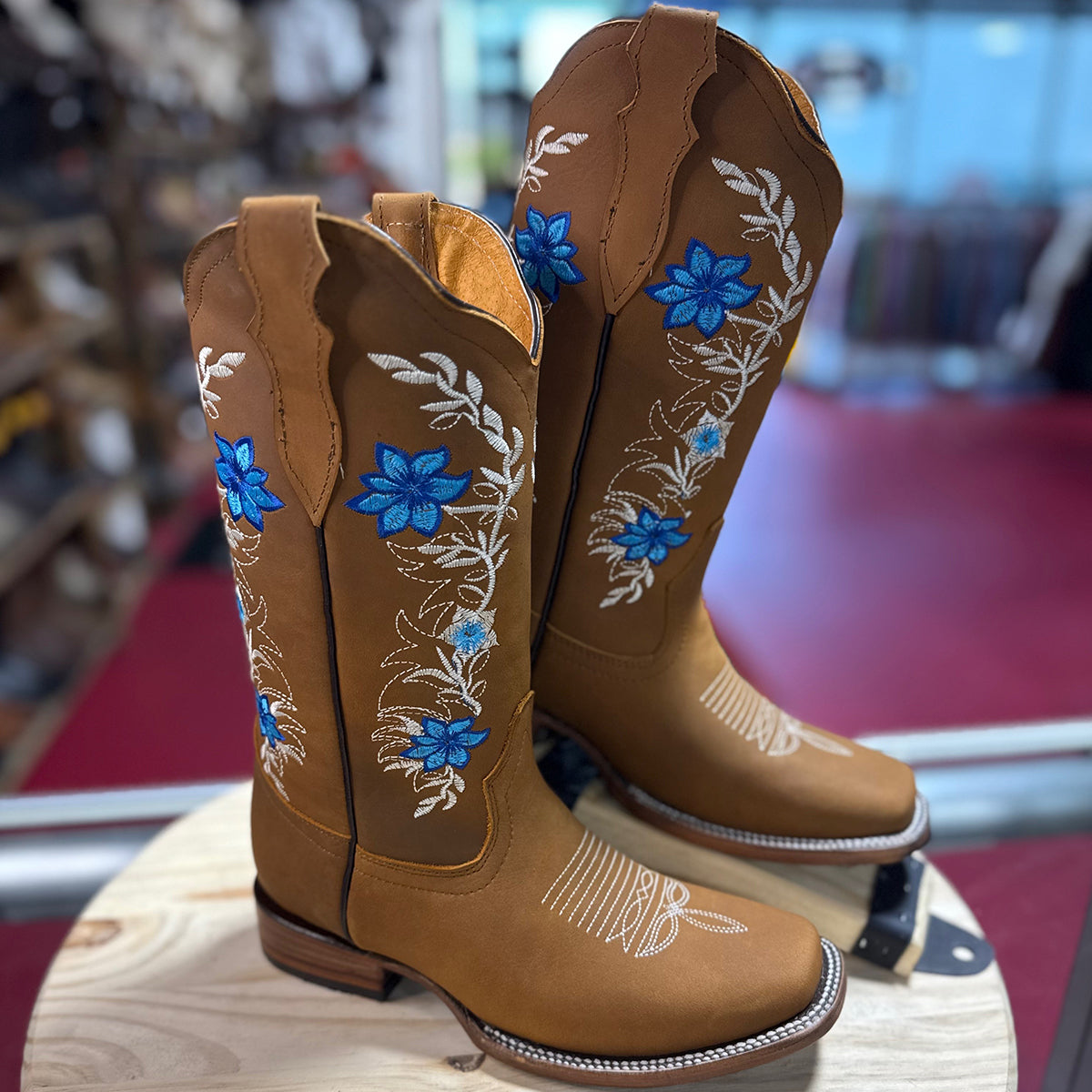 Light Brown Cowgirl Boots with Blue Floral Details and Square Toe